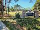 Community sign indicating recreation area, pool, tennis court, and park at 13055 Overstreet Rd, Windermere, FL 34786
