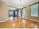 Hardwood floors and recessed lighting highlight this open-concept living area at 13055 Overstreet Rd, Windermere, FL 34786