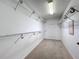 Spacious walk-in closet with shelving at 13055 Overstreet Rd, Windermere, FL 34786