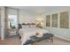 Relaxing main bedroom with soft neutral tones, stylish furniture, and decorative wall art at 136 Jones Fish Camp Rd, Edgewater, FL 32141