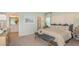 Comfortable main bedroom features a spacious layout with ensuite bathroom and walk-in closet at 136 Jones Fish Camp Rd, Edgewater, FL 32141