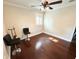 This bedroom features hardwood floors, neutral walls, modern trim and neutral walls at 1400 Yates St, Orlando, FL 32804