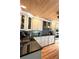 Modern kitchen with stainless steel appliances, granite countertops, and custom backsplash at 1400 Yates St, Orlando, FL 32804