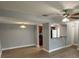 Open concept living area with a ceiling fan and view of kitchen at 190 Riverbend Dr # 102, Altamonte Springs, FL 32714