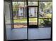 Screened lanai overlooks serene, landscaped grounds at 190 Riverbend Dr # 102, Altamonte Springs, FL 32714