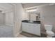 Bathroom featuring a vanity with storage cabinets, modern fixtures, and a neutral color scheme at 206 E South St # 6007, Orlando, FL 32801