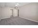 Bedroom featuring neutral walls and carpeting, a ceiling fan, and two closets at 206 E South St # 6007, Orlando, FL 32801