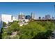 Beautiful city view with lush trees at the foreground of the skyline buildings at 206 E South St # 6007, Orlando, FL 32801