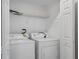 Convenient laundry room featuring a washing machine and dryer for in-unit laundry at 206 E South St # 6007, Orlando, FL 32801