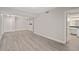 Well-lit living room, offering a seamless transition to the kitchen and bathroom at 206 E South St # 6007, Orlando, FL 32801
