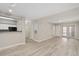 Open concept living room with a view of the kitchen, providing ample space at 206 E South St # 6007, Orlando, FL 32801