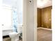 A view to the bathroom and the bedroom from an open doorway at 211 N Randolph Ave, Kissimmee, FL 34741