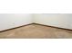 Bedroom features carpet flooring and base trim with electrical outlets on the neutral painted walls at 211 N Randolph Ave, Kissimmee, FL 34741