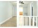 Bright hallway with tile floors offers seamless transition to other rooms and features at 211 N Randolph Ave, Kissimmee, FL 34741