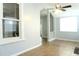Bright living area with tile floors, natural light, and views into adjoining rooms at 211 N Randolph Ave, Kissimmee, FL 34741
