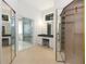 Main bedroom with -and- closets, vanity area, and access to a luxurious Primary bath at 235 Promenade Cir, Lake Mary, FL 32746