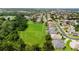 Aerial view showcasing the home's location near green spaces and neighborhood streets at 2681 Cabernet Cir, Ocoee, FL 34761