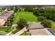 Aerial shot capturing the home with green space, landscaping, and neighborhood layout at 2681 Cabernet Cir, Ocoee, FL 34761