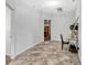 Cozy office space features neutral walls, tile floors, and a leaning desk with shelving at 2681 Cabernet Cir, Ocoee, FL 34761