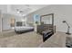 Well-lit main bedroom with neutral colors, carpeted floors, and ample closet space at 2681 Cabernet Cir, Ocoee, FL 34761