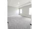 Bright and spacious bedroom with plush carpet and lots of natural light at 2699 Sw 161St Loop, Ocala, FL 34473
