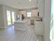 Modern kitchen with white cabinetry, stainless steel appliances, and quartz countertops at 2699 Sw 161St Loop, Ocala, FL 34473