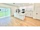 Bright and airy kitchen featuring a kitchen island and stainless steel appliances at 319 Anchovie Ct, Poinciana, FL 34759