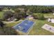 Aerial view of a well-maintained community basketball court and park at 3426 Schoolhouse Rd, Harmony, FL 34773