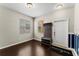 Bright foyer features hardwood floors, coat rack with shoe storage, and a welcoming ambiance at 3426 Schoolhouse Rd, Harmony, FL 34773