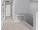 Carpeted hallway provides transition to different areas of the home at 3426 Schoolhouse Rd, Harmony, FL 34773