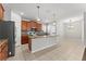 Beautiful kitchen with stainless steel appliances, granite countertops, and a central island at 3426 Schoolhouse Rd, Harmony, FL 34773