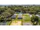 An aerial shot shows the property with a large lot, neighborhood, and view of the surrounding area at 3678 Rollin O Ln, Apopka, FL 32703
