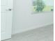 Bedroom showing new carpet, door and window to backyard at 471 Wayland Dr, Haines City, FL 33844