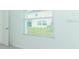 Bedroom with a large window and new neutral carpet at 471 Wayland Dr, Haines City, FL 33844