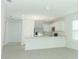 Bright kitchen featuring stainless steel appliances and a breakfast bar at 471 Wayland Dr, Haines City, FL 33844