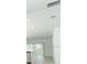 An open concept kitchen with an island, stainless steel appliances, and modern fixtures at 471 Wayland Dr, Haines City, FL 33844