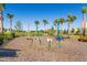 Community playground offering recreational fun with swings, climbing structures and natural surroundings at 471 Wayland Dr, Haines City, FL 33844