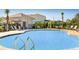 Community pool area with pool house, seating, and landscaping offers a relaxing escape at 471 Wayland Dr, Haines City, FL 33844