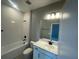 Well-lit bathroom with vanity, sink and mirror plus a shower and bathtub combo at 5324 Center Lake Ranch Blvd, St Cloud, FL 34771