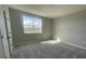 Neutral bedroom with carpet, a window view and a closet with bi-fold doors at 5324 Center Lake Ranch Blvd, St Cloud, FL 34771