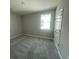 Neutral bedroom with carpet and a window view at 5324 Center Lake Ranch Blvd, St Cloud, FL 34771