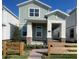 Charming two-story home with a quaint front porch and well-maintained landscaping at 5324 Center Lake Ranch Blvd, St Cloud, FL 34771
