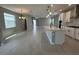 Open-concept living space with hardwood floors, recessed lighting, and abundant natural light at 5324 Center Lake Ranch Blvd, St Cloud, FL 34771