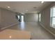 Spacious living room with hardwood floors, recessed lighting, and stairs leading to the upper level at 5324 Center Lake Ranch Blvd, St Cloud, FL 34771