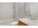 Bathroom featuring a shower-tub combo, a toilet, and a vanity at 579 Setting Sun Dr, Winter Garden, FL 34787