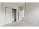 A large bedroom features a closet and a neutral paint, providing a blank canvas at 579 Setting Sun Dr, Winter Garden, FL 34787