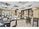Upscale clubhouse with elegant lighting, comfortable seating, a bar, and community gathering spaces at 6112 Broad Oak Dr, Davenport, FL 33837