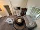 Bright living room with large windows, comfortable seating, and hardwood flooring at 6224 Zane Dr, Mount Dora, FL 32757