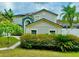Charming two-story home featuring a landscaped front yard, inviting facade, and well-maintained exterior at 7727 Glynde Hill Dr, Orlando, FL 32835