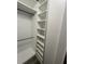Practical walk-in closet featuring shelving for storage at 7727 Glynde Hill Dr, Orlando, FL 32835